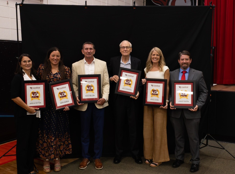 Sheila Fetter, Tara Isable, Rick Heller, Paul Sorenson, Nikole Johns, and Stanley Sedore with their Hall of Fame certificates.