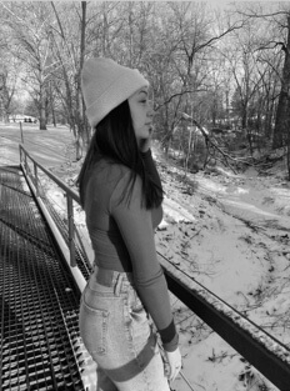 Cardinal iJAG student Hannah Hager looking out on a walkway.