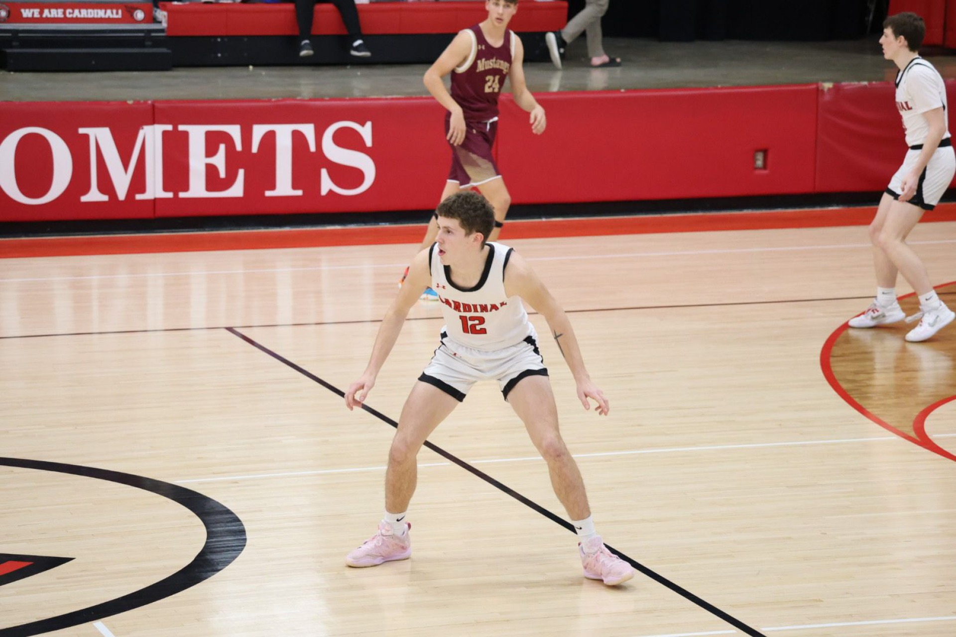 Male student playing basketball