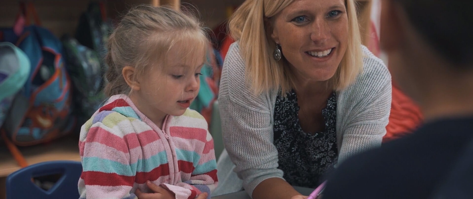 Cardinal Community School District preschool teacher with student.